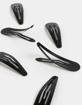 Set de seis hebillas tic tac negras para el pelo.