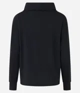 Polera hecha en tela canalé con tacto peluche, color ladrillo, con cuello alto, mangas largas y lazo en el bajo.