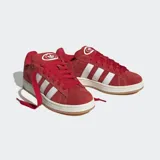 Championes de gamuza color rojo con tres franjas blancas y diseño inspirado en los 80s, ideal para el uso diario.