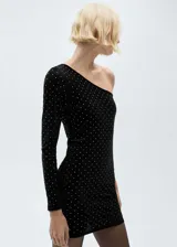 Minivestido negro de terciopelo con un solo hombro, manga larga y apliques de strass.
