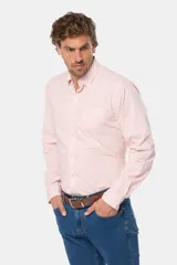 Camisa azul marino de manga larga con bolsillo en el pecho, confeccionada en algodón.