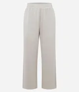 Pantalón recto color rosado, confeccionado en modal, con cintura elástica y ajuste por cordón delantero. Presenta una caída suelta en las piernas y bajo sencillo.