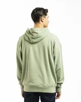 Buzo canguro verde con capucha y bolsillo frontal, de corte oversized.