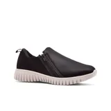 Championes deportivos casuales Usaflex, color negro, con diseño slip-on y cierre lateral con cremallera. Suela blanca con diseño acanalado.
