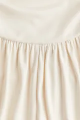 Short color crudo de punto acanalado fino de viscosa, con cintura ancha y costuras laterales fruncidas que crean un efecto drapeado.