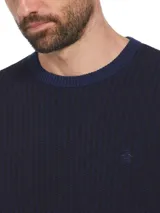 Sweater de punto azul marino con diseño jacquard bitono, cuello redondo y logo bordado de Original Penguin.
