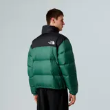 Campera puffer verde y negra The North Face modelo Retro Nuptse 700, con relleno de plumas, cierre frontal y cuello alto.