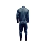 Conjunto deportivo Umbro color azul marino con detalles en blanco, compuesto por campera con cierre y pantalón.