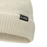 Gorro de lana Converse unisex, color crema, con etiqueta negra con el logo de la marca en el borde.
