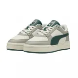 Championes urbanos Puma CA Pro Classic II, color negro con detalles dorados y suela blanca con línea negra.