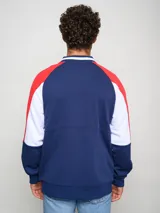 Campera bomber roja oficial de fútbol, con cierre frontal y detalles en blanco.