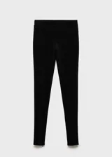 Pantalón negro de tejido de punto ligero, corte slim fit, cintura elástica, detalle de costuras verticales y cierre con cremallera en los bajos.