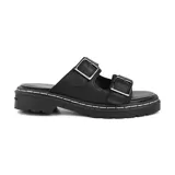 Sandalias bajas color verde militar con doble tira ancha con hebillas metálicas y suela track color negro.