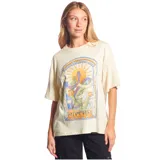 Remera color crema de corte holgado, con estampado de un diseño artístico con una serpiente, el sol y el logo de la marca Rip Curl.