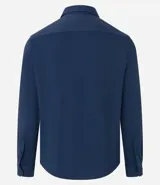 Camisa azul marino de manga larga, confeccionada en tejido piqué de poliamida y elastano. Cuenta con cuello inglés, abotonadura frontal y tecnología performance que ofrece elasticidad, secado rápido y resistencia a las arrugas.