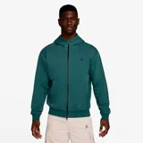 Campera deportiva Jordan Sport Hoop con capucha y cierre frontal, color verde con logo bordado en negro.