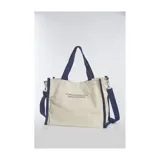 Bolso tipo shopper de tela color crema con asas cortas y correa larga desmontable. Estampado de un ave fénix color naranja.