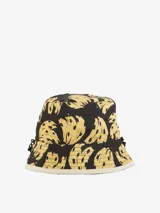 Sombrero tipo bucket negro con estampado de bananas amarillas.