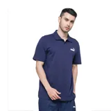 Chomba Puma ESS color azul marino con logo blanco bordado en el pecho.