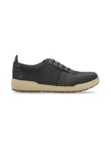 Championes urbanos Hush Puppies modelo Draper, color azul marino, confeccionados en cuero, con cordones grises, plantilla Smart Foam® y suela de goma color beige.