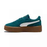 Championes Puma Palermo Elevata, color negro con franja blanca y suela marrón.