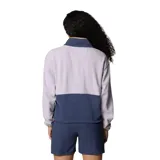 Campera Columbia de microfibra aterciopelada, con cierre frontal completo, bolsillos laterales con cremallera, ribete elástico en puños y dobladillo, y detalle de nailon en el pecho.