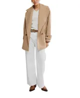 Abrigo tipo peacoat de corte oversize y silueta cuadrada, confeccionado en mezcla de lana con patrón de espiga en tonos negro y gris. Presenta cuello de solapa, cierre frontal de doble botonadura y mangas largas.