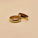 Par de alianzas de oro amarillo 18k, modelo bombé de 5mm de ancho.