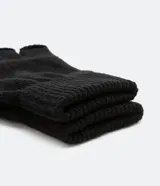 Par de guantes negros tejidos, sin dedos y con puño acanalado.
