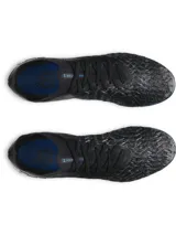 Championes de fútbol Under Armour Magnetico Elite 5 FG para hombre, color negro con detalles en azul. Diseñados para adaptarse a la forma del pie y maximizar el control en la cancha.