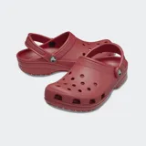 Zapatillas tipo clog en color verde, livianas y cómodas, con calce amplio y personalizables con Jibbitz™.