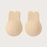 Par de cubre pezones color piel con forma de conejo y efecto push up.
