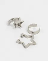 Set de bijou cuff plateados con forma de aro, estrella y llave.