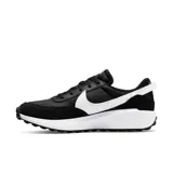 Championes Nike Waffle Debut negros con detalles en blanco y naranja.