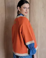 Sweater rojo de lana lambswool con mangas 3/4.