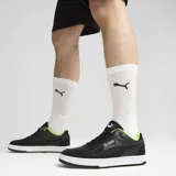 Championes Puma MAPF1 Caven 2.0, color negro con detalles en verde y logo de Mercedes AMG Petronas.