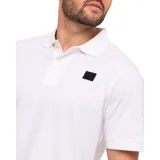 Remera tipo polo color petróleo con cuello de punto acanalado, puños de manga de punto plano y parche de silicona con el logo de Cat en el lado izquierdo del pecho.