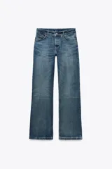 Jeans largos de tiro bajo, corte bootcut y efecto lavado.