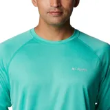 Remera de manga larga Columbia Terminal Tackle Heat, color gris jaspeado, con logo de la marca en el pecho y en la manga. Confeccionada en tejido transpirable de secado rápido y protección solar UPF 50.