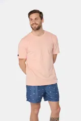 Short de baño azul con estampado de motivos marinos en blanco, cintura elástica con cordón ajustable, bolsillos laterales y suspensor de malla fina.