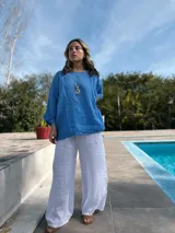 Blusa amarilla de lino con mangas 3/4 y corte holgado.