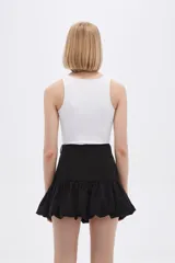 Body sin mangas color borgoña, de poliamida, liso, al cuerpo, con broches y cuello halter.