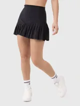 Minifalda deportiva negra con cintura alta y falda plisada.