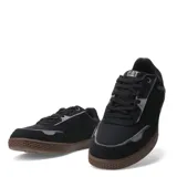 Championes urbanos Caterpillar Pause Retro Canvas, color negro con detalles en gris y suela marrón.