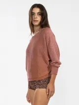 Sweater tejido en jersey con lurex, escote bote y detalle de tigre insignia de Polonio en la espalda.