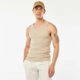 Musculosa beige de tejido calado con cuello redondo.