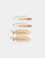 Set de cuatro hebillas para el pelo de resina con forma ovalada y broche metálico dorado.
