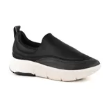 Championes negros de Usaflex, de estilo casual y deportivo, con plataforma blanca y suela negra.