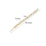Pulsera dorada con eslabones ovalados, algunos con circonias blancas. Fabricada en acero quirúrgico con baño de oro 18k.