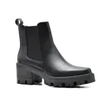 Botas Chelsea color hueso, con elásticos laterales, suela track y tacón bloque de madera.